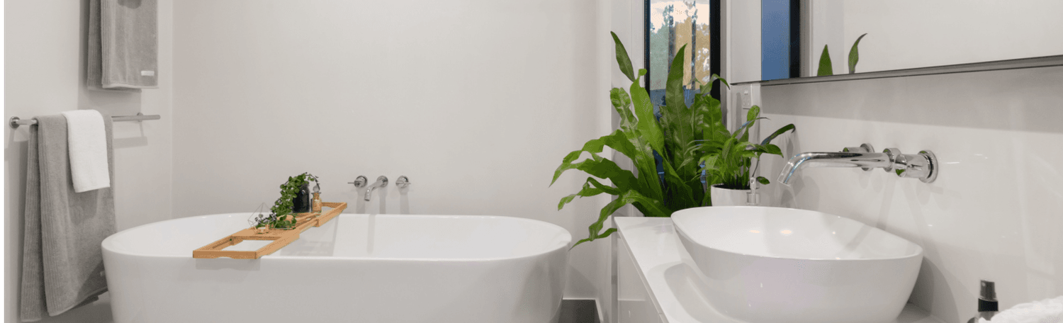 Impressie van een badkamer met de HeatCycle warmtepomp voor het leveren van tapwater.